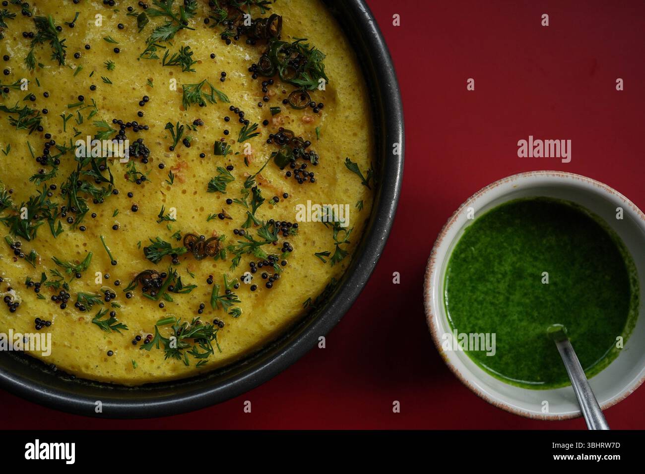 Dhokla - Popular Indian gujarati steamed breakfast dish with chickpea flour Stock Photo