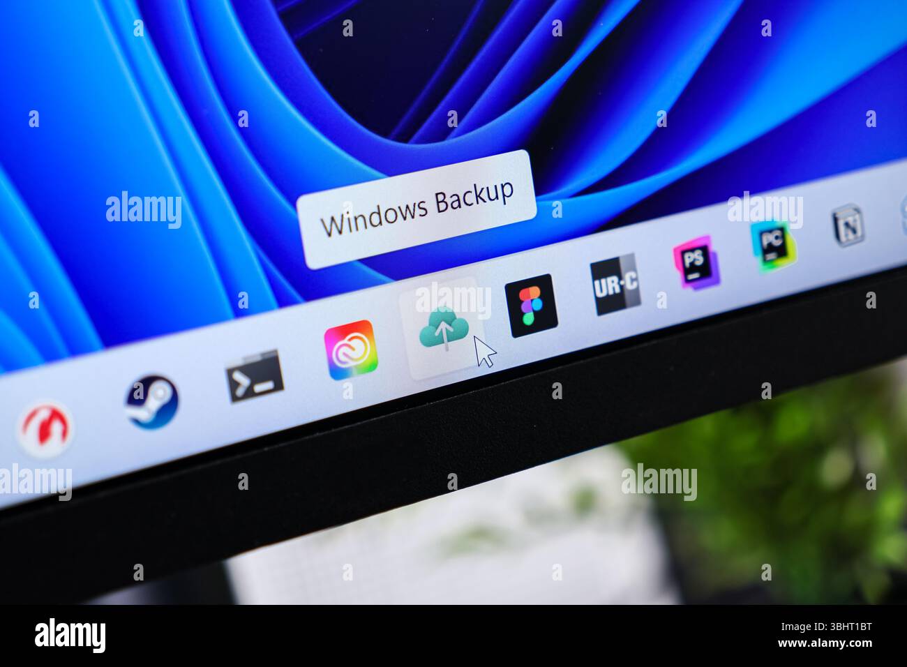 Poznan, Poland - June 6, 2025: The Windows Backup application icon on a computer screen, with a mouse cursor, illustrating cloud data storage and reli Stock Photo