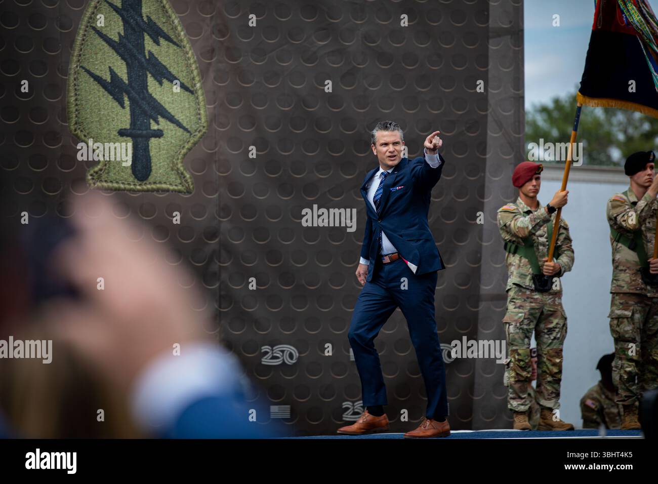 U.S. Secretary of Defense Pete Hegseth points toward Service Members during the Army 250th Birthday Celebration at Fort Bragg, N.C., June 10, 2025.  The event celebrates the U.S. Army's 250th birthday and honors the dedication and service of America's Soldiers. (U.S Army photo by Pfc. Jaquari Lindsey) Stock Photo