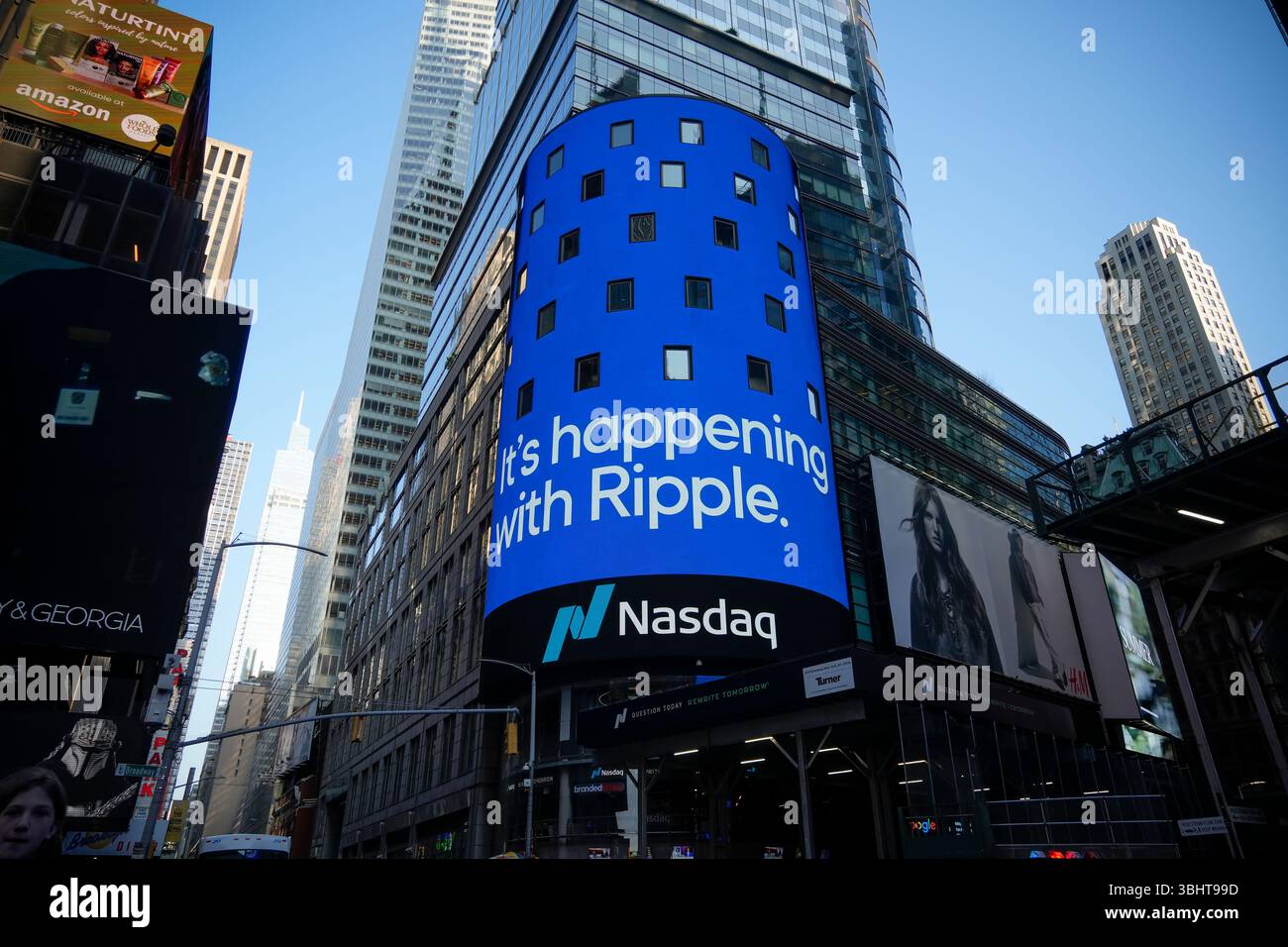 The giant video screen on the Nasdaq stock exchange in Times Square in New  York decorated for Ripple, the cryptocurrency company behind the XRP, on  Wednesday, June 4, 2025. Ripple and the