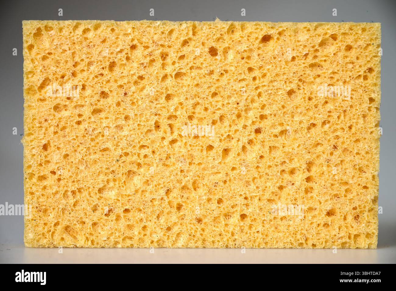 Yellow sponge texture for background Stock Photo