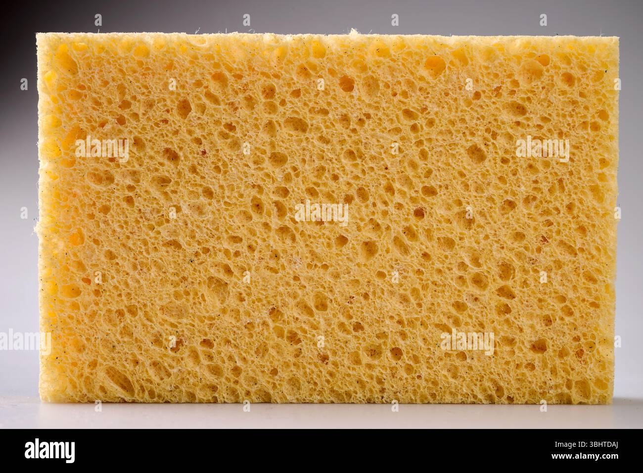 Yellow sponge texture for background Stock Photo