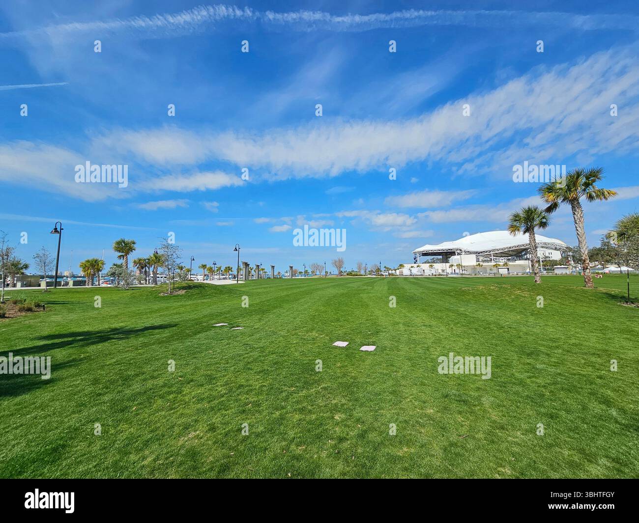 Coachman Park is located on the waterfront in downtown Clearwater.  There is a large covered outdoor theatre and dockside pedestrian walkways. - Smartphone Captured Stock Image