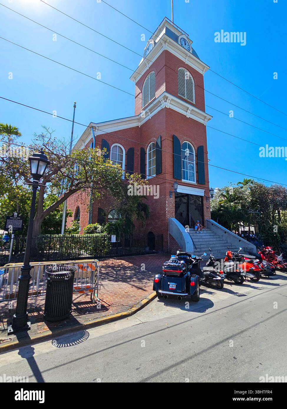 The former City Hall houses the Key West Chamber of Commerce and a visitors center, and is managed by the Historic Florida Keys Foundation. - Smartphone Captured Stock Image