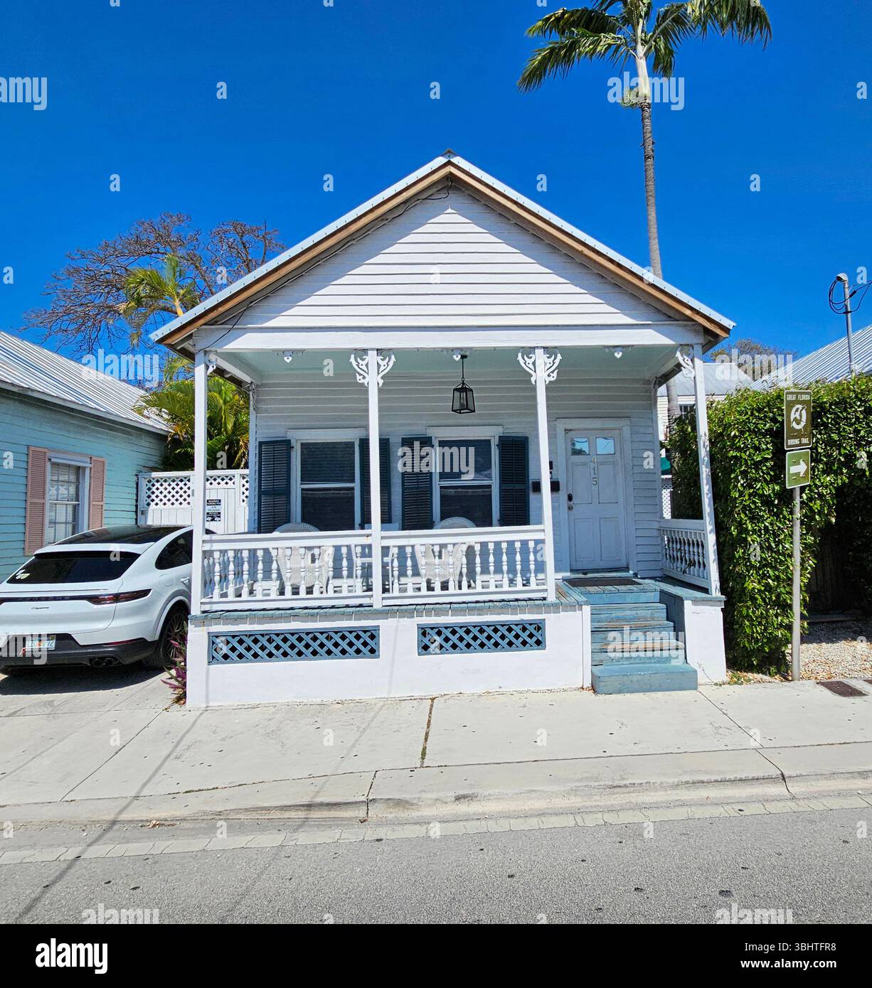A typical historic home in Old Town Key West.  The shotgun houses were designed to stay cool in a hot climate. - Smartphone Captured Stock Image