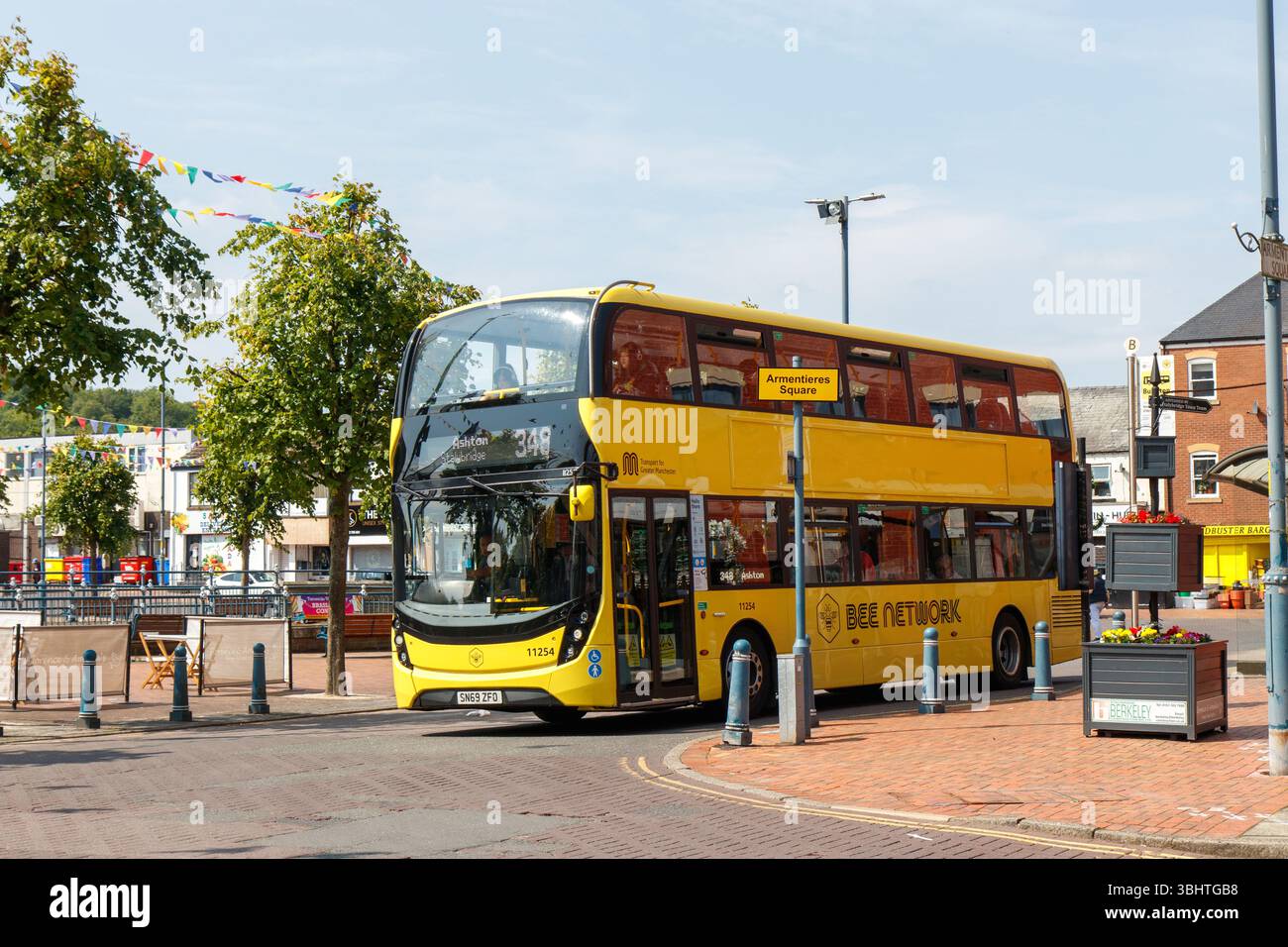 A Bee Network double decker bus in Stalybridge at Armentieres Square ...