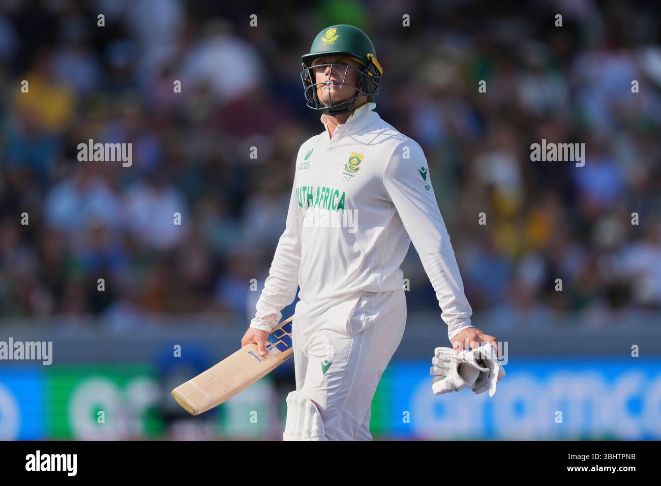 South Africa's Ryan Rickelton walks off the field after losing his ...