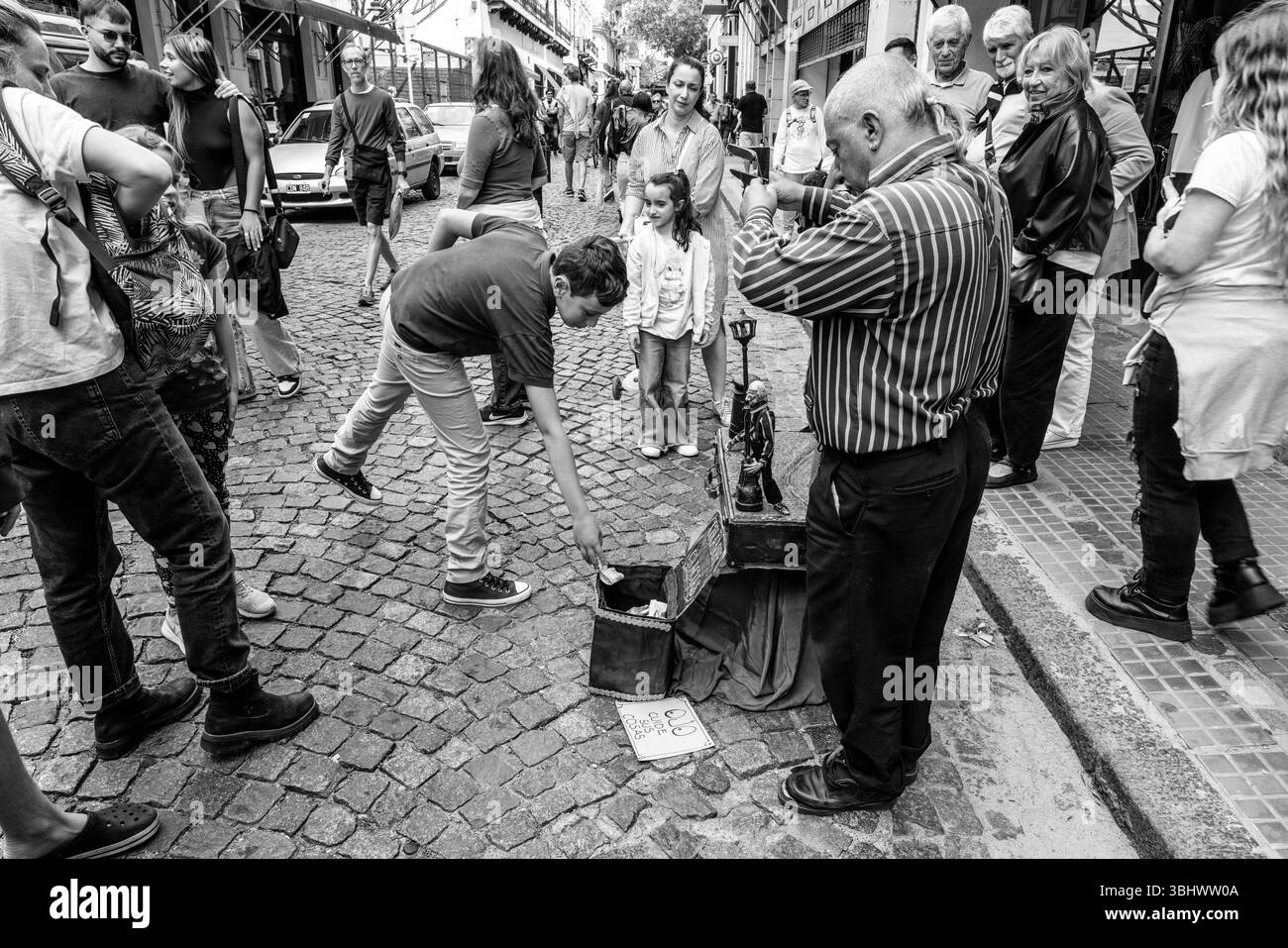 A Man Performs A Traditional Puppet Show At The San Telmo Sunday Market ...