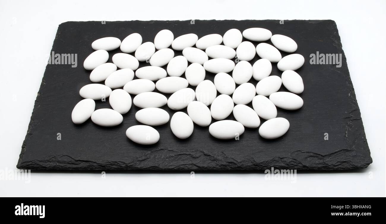 Jordan almonds isolated on black display. Stock Photo