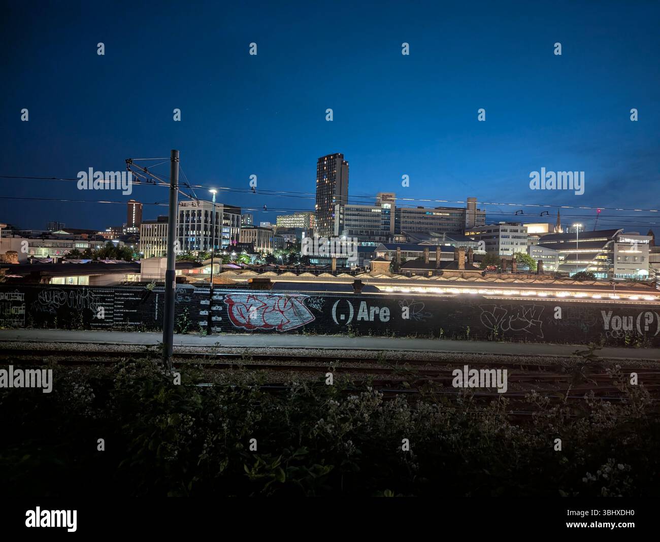 Sheffield city centre transformed by night, a vibrant urban landscape. - Smartphone Captured Stock Image