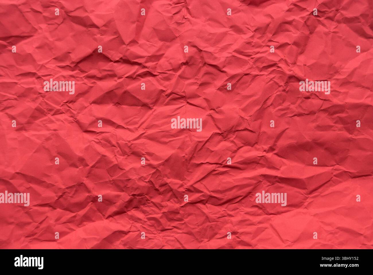 Red color crumpled paper for background. Stock Photo