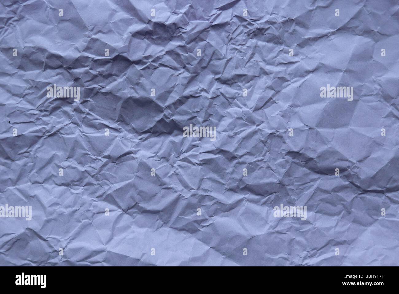 Purple color crumpled paper for background. Stock Photo