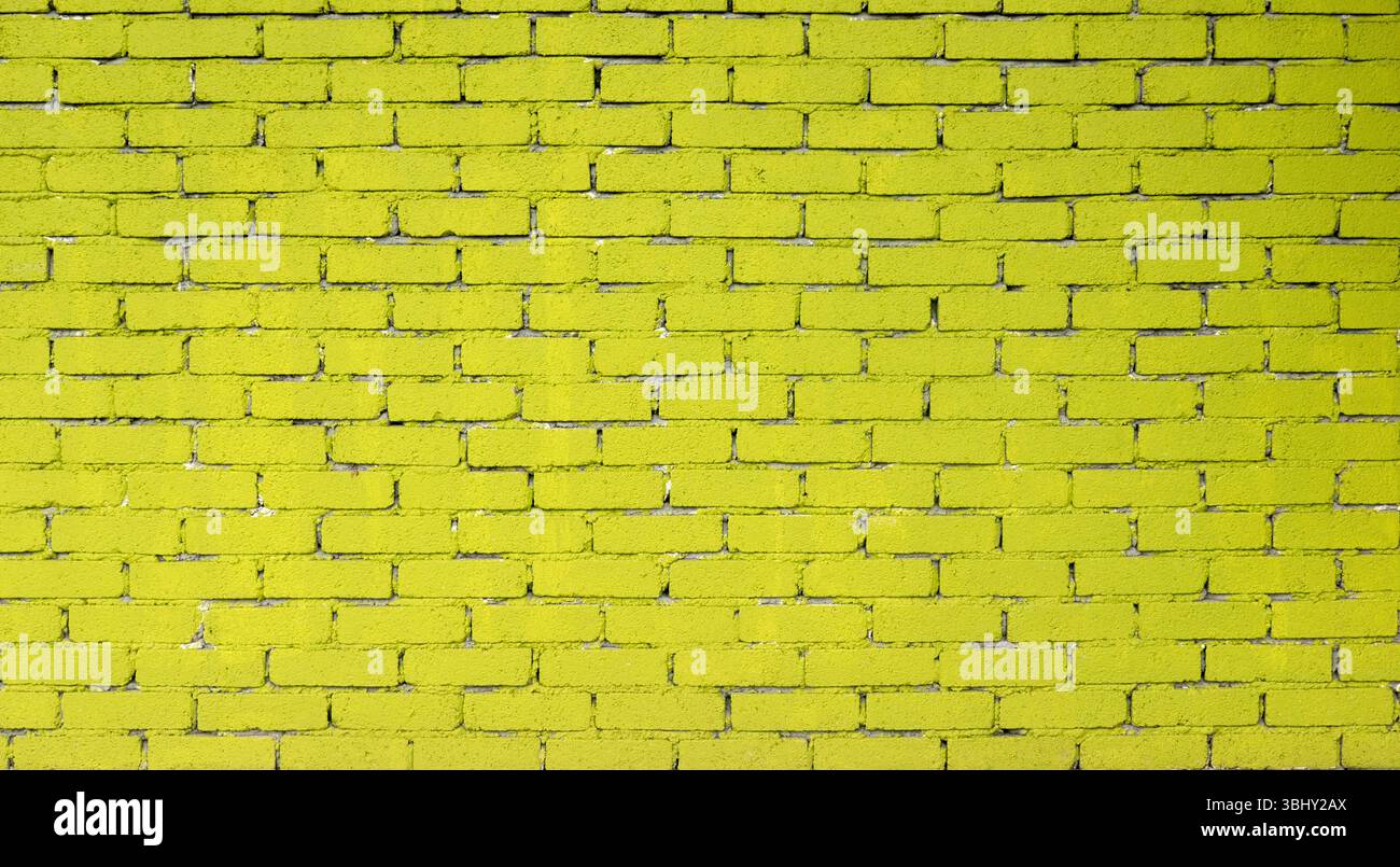 Bright Yellow Painted Brick Wall Background Stock Photo