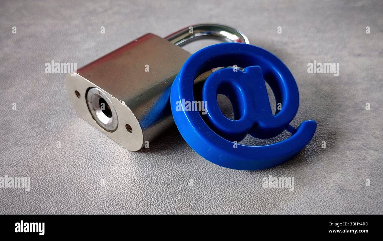 At symbol and padlock. Email security concept. Stock Photo
