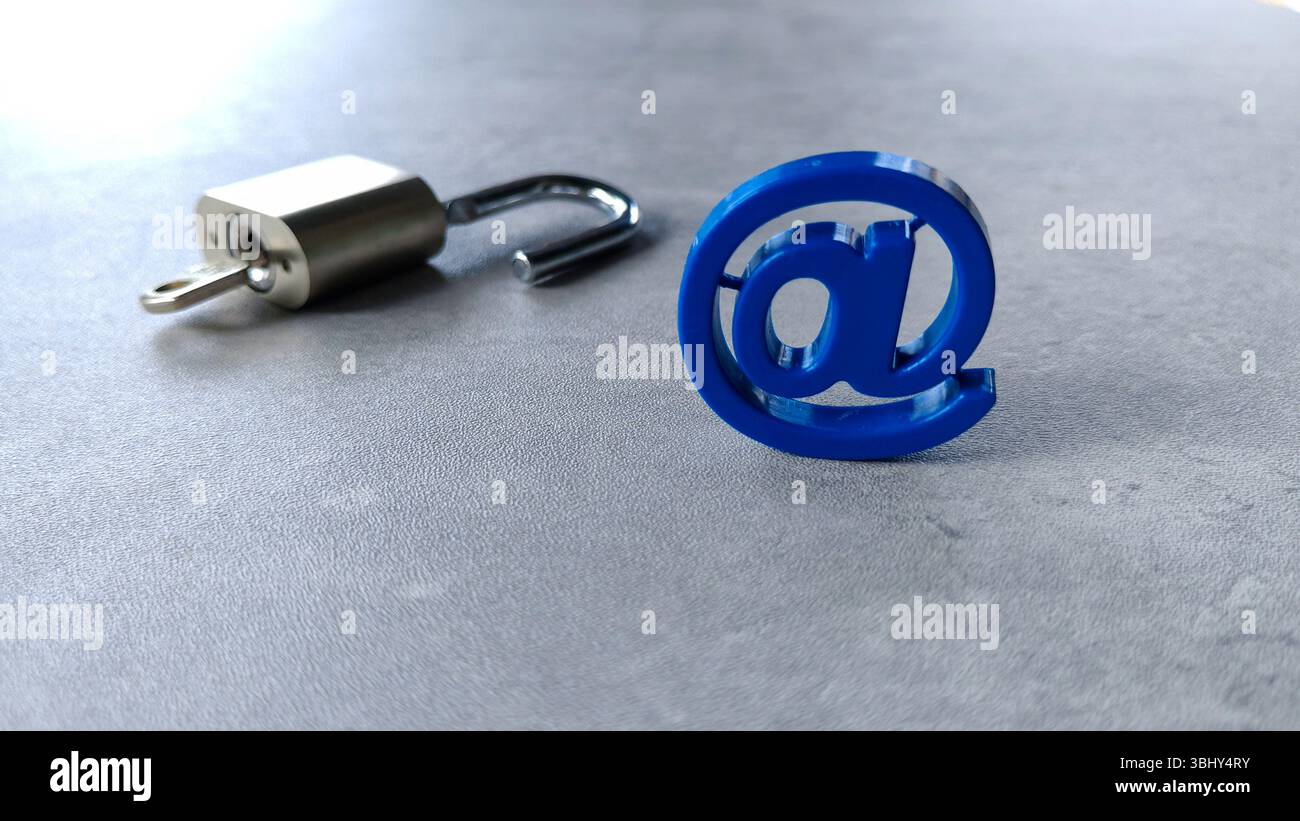 At symbol and padlock. Email security concept. Stock Photo