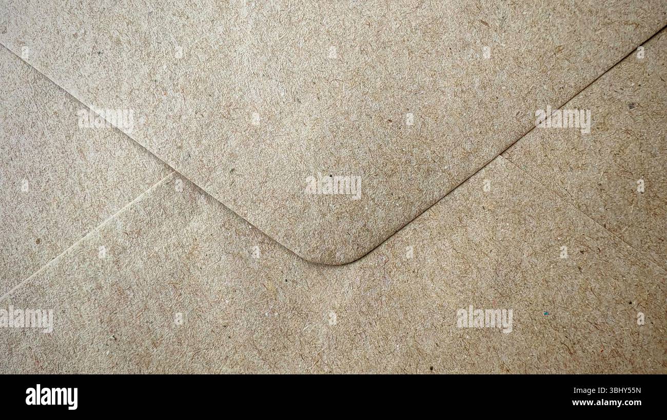 Close-up of a Textured Brown Paper Envelope Stock Photo