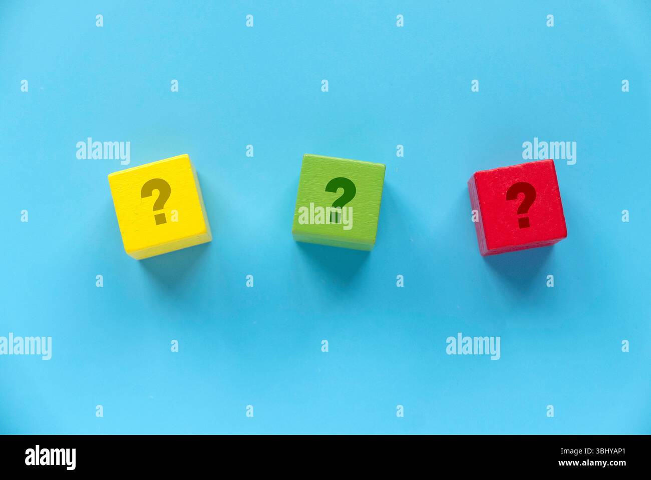 Colorful Wooden Blocks with Question Marks on Blue Background Stock ...