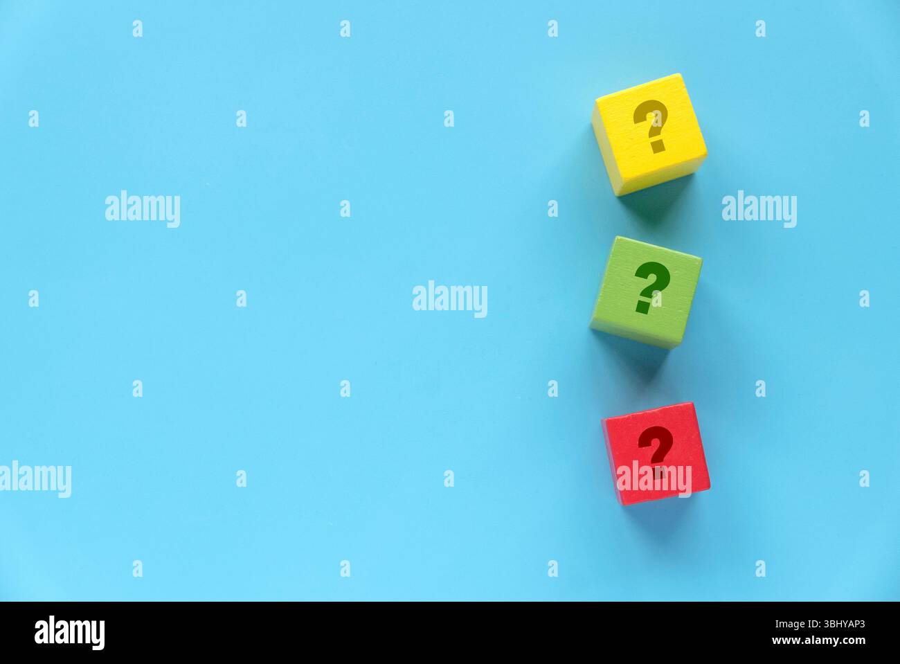 Colorful Wooden Blocks with Question Marks on Blue Background Stock ...