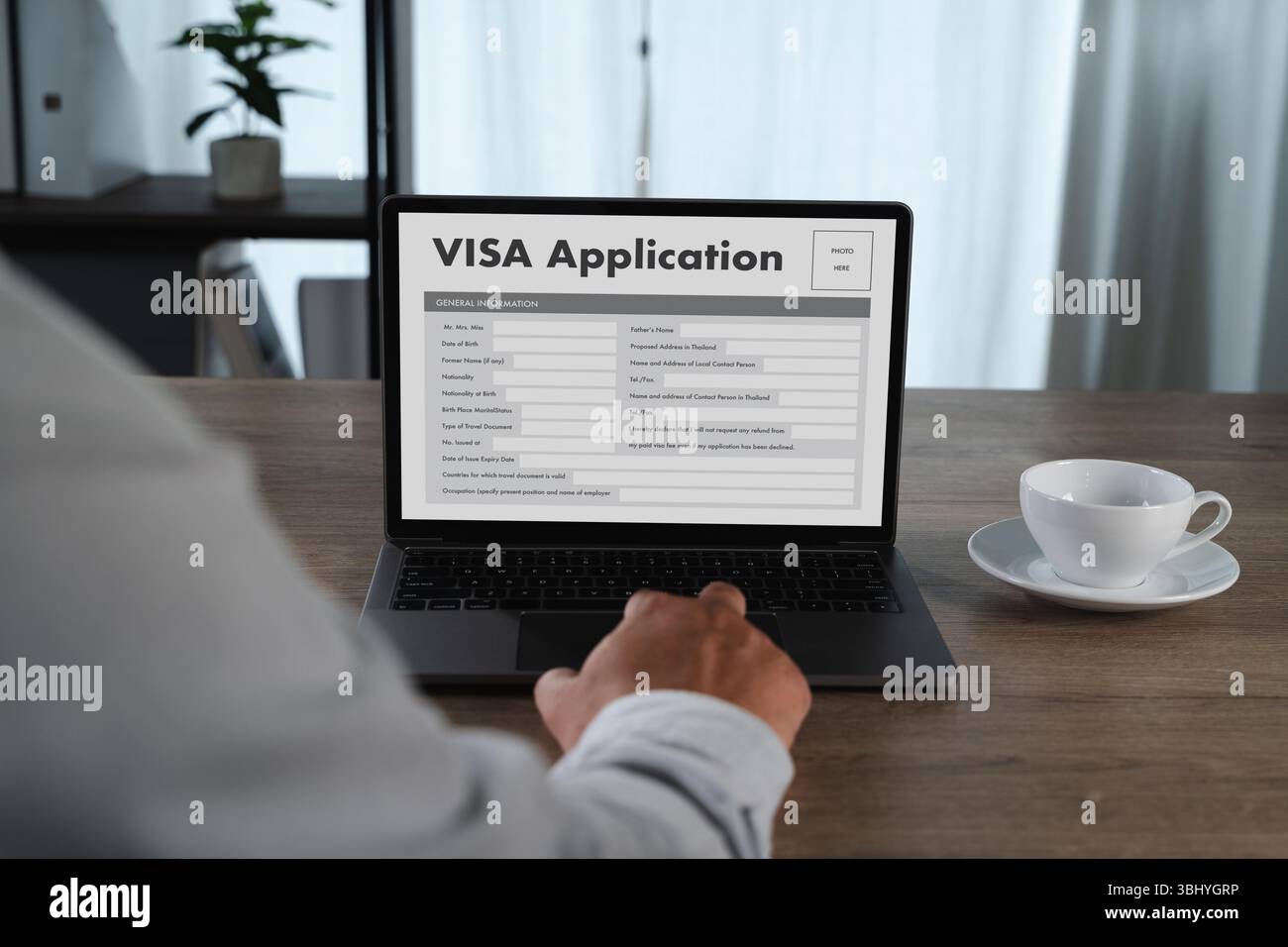 Person Filling Visa Application Form Stock Photo - Alamy