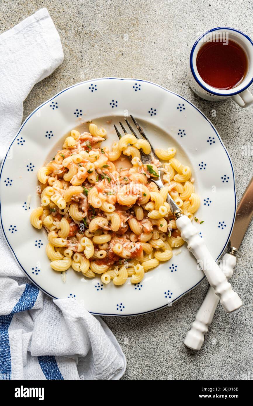 A delicious serving of chifferi rigati pasta, topped with savory tomato ...