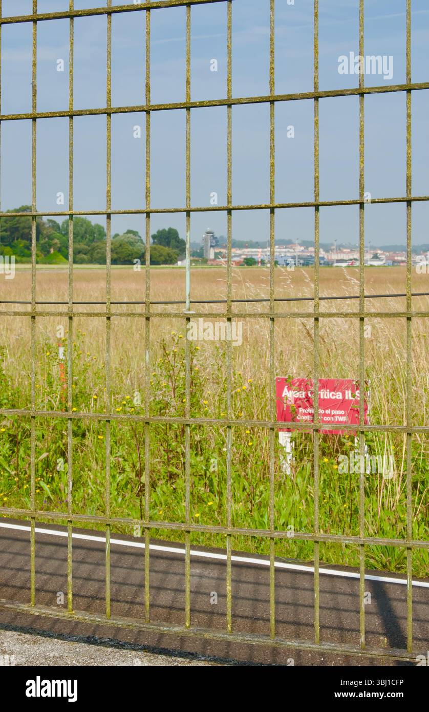Prohibited warning sign ILS critical area behind the perimeter fence ...