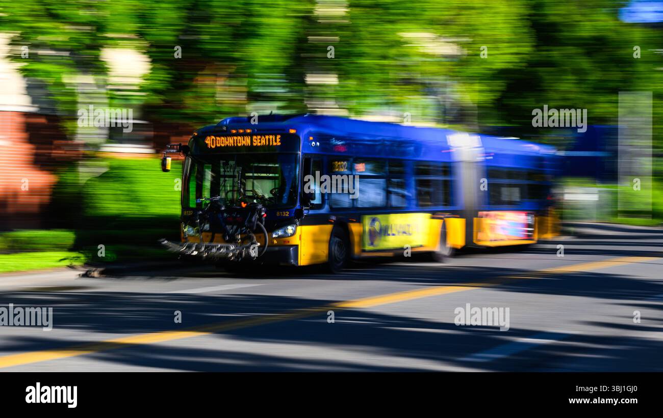 Seattle - June 8, 2025; King County Metro bus with intentional camera movement to blur scene Stock Photo
