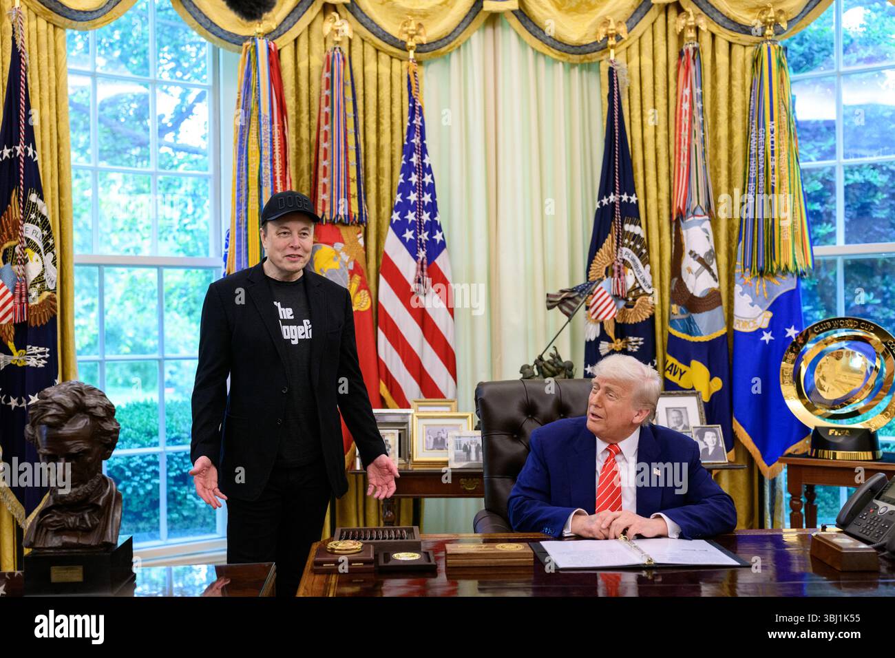 President Donald Trump participates in a press conference with departing DOGE adviser Elon Musk, Friday, May 30, 2025, in the Oval Office. Stock Photo