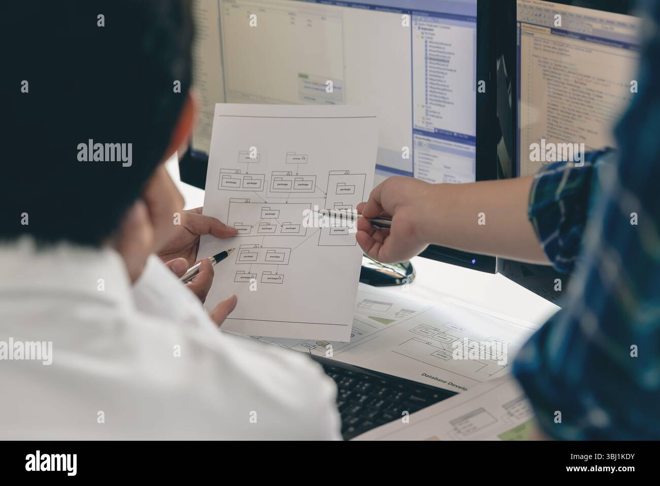 Programmers team working in a software developing. Developing programming and coding technologies. Website design. Cyber space concept. Stock Photo