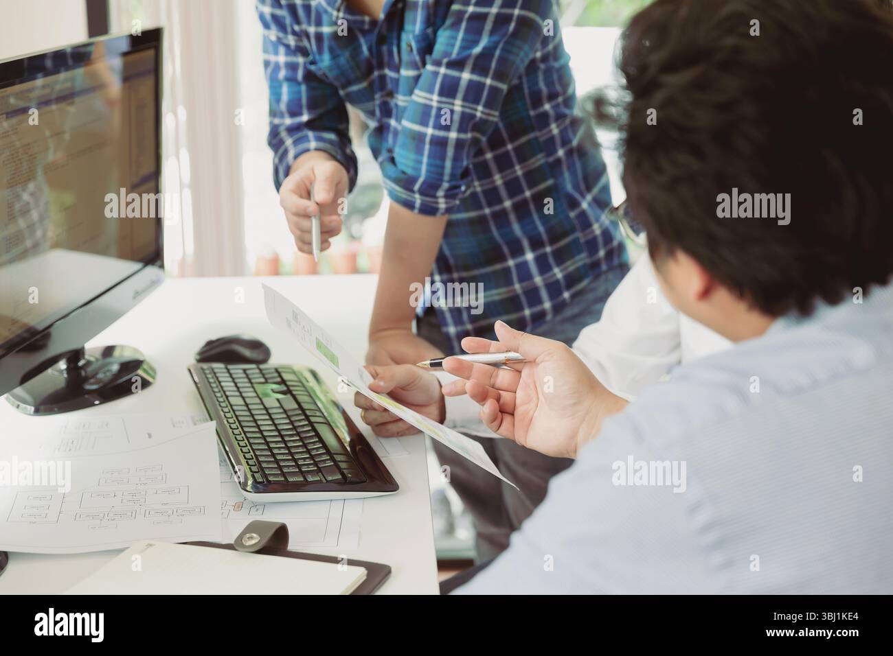 Programmers team working in a software developing. Developing programming and coding technologies. Website design. Cyber space concept. Stock Photo