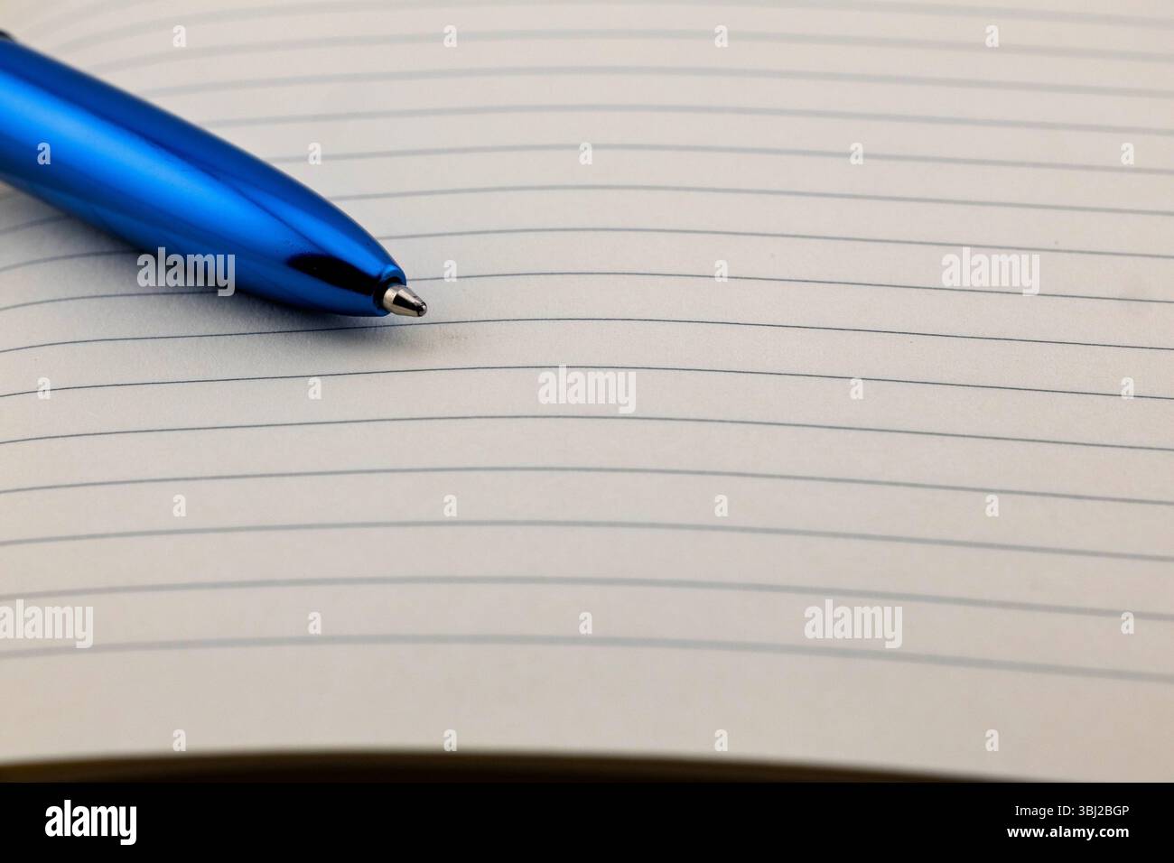Notebook with ballpoint pen Stock Photo