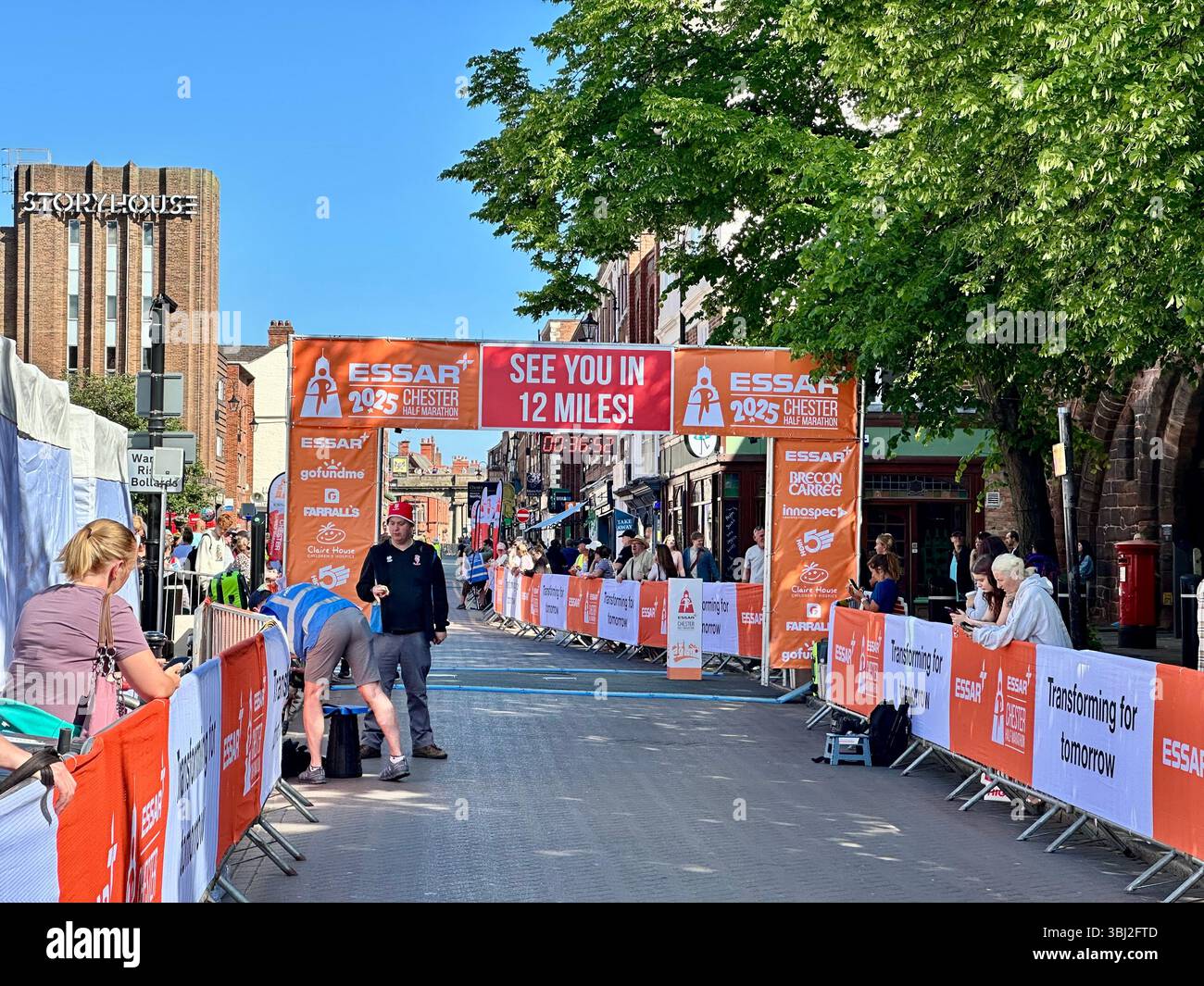 Chester Half Marathon finish line set up with stewards and spectators, Chester, Cheshire, England, 18 May 2025 - Smartphone Captured Stock Image