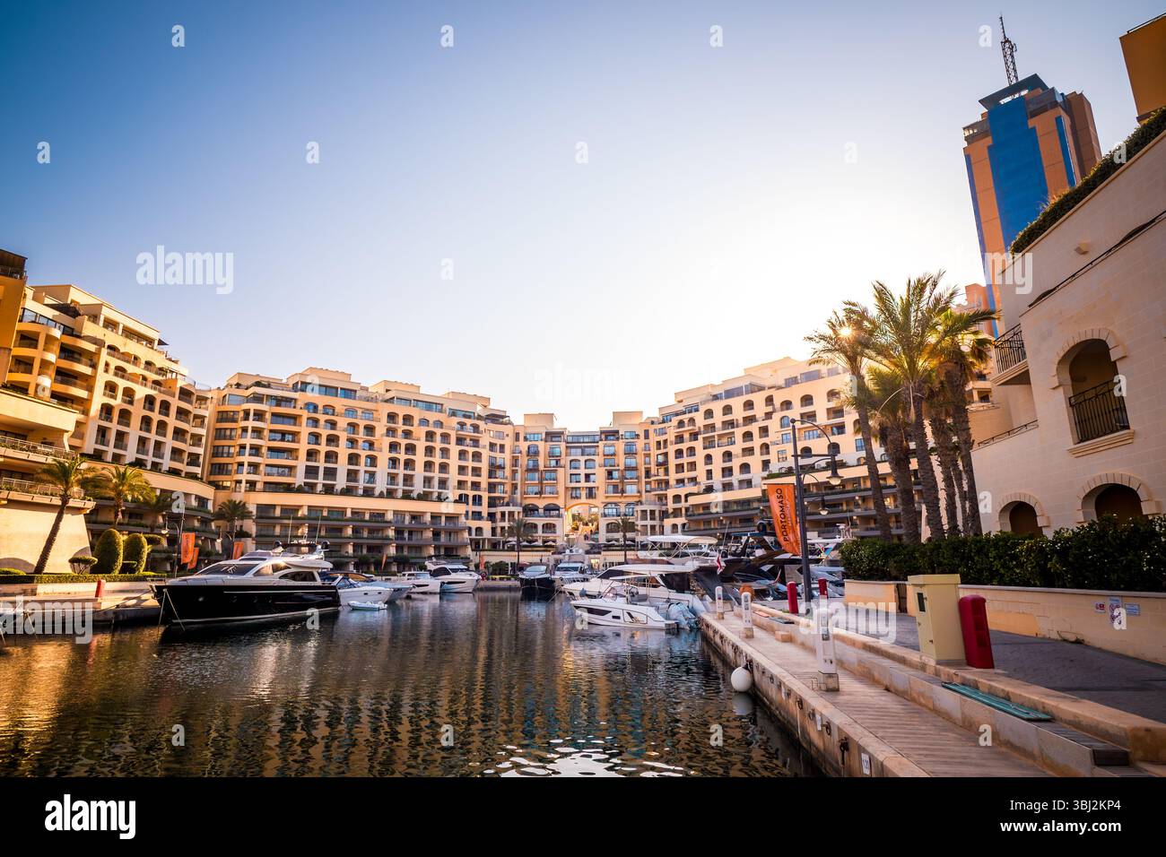 Beautiful, scenic view of luxury boats and yachts moored at the Portomaso Marina in St. Julian's (San Ġiljan), Malta Stock Photo