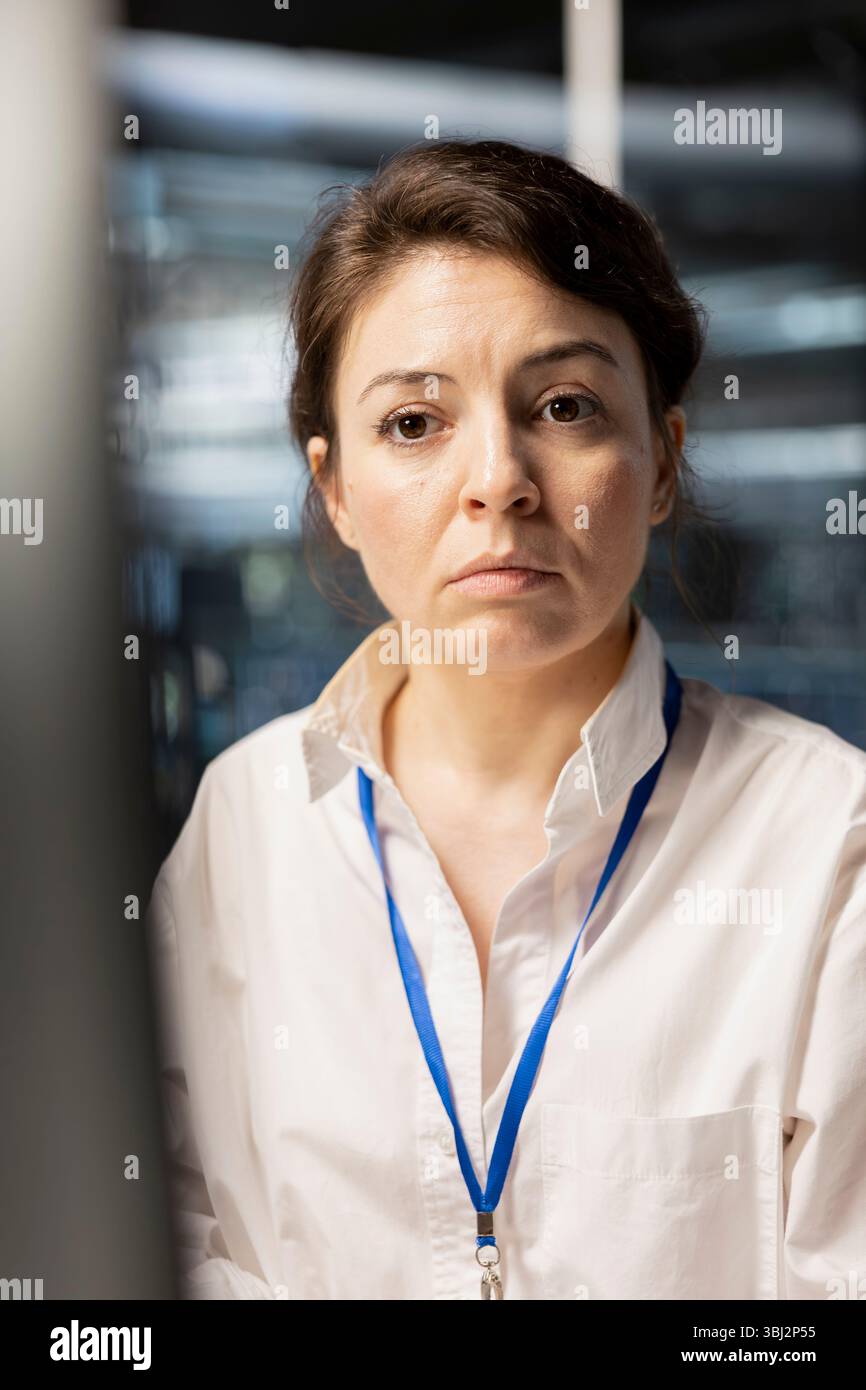 Data center software developer analyzing program logs metrics, optimizing storage systems. Close up of server hub IT specialist inspecting resource utilization, managing application efficiency Stock Photo