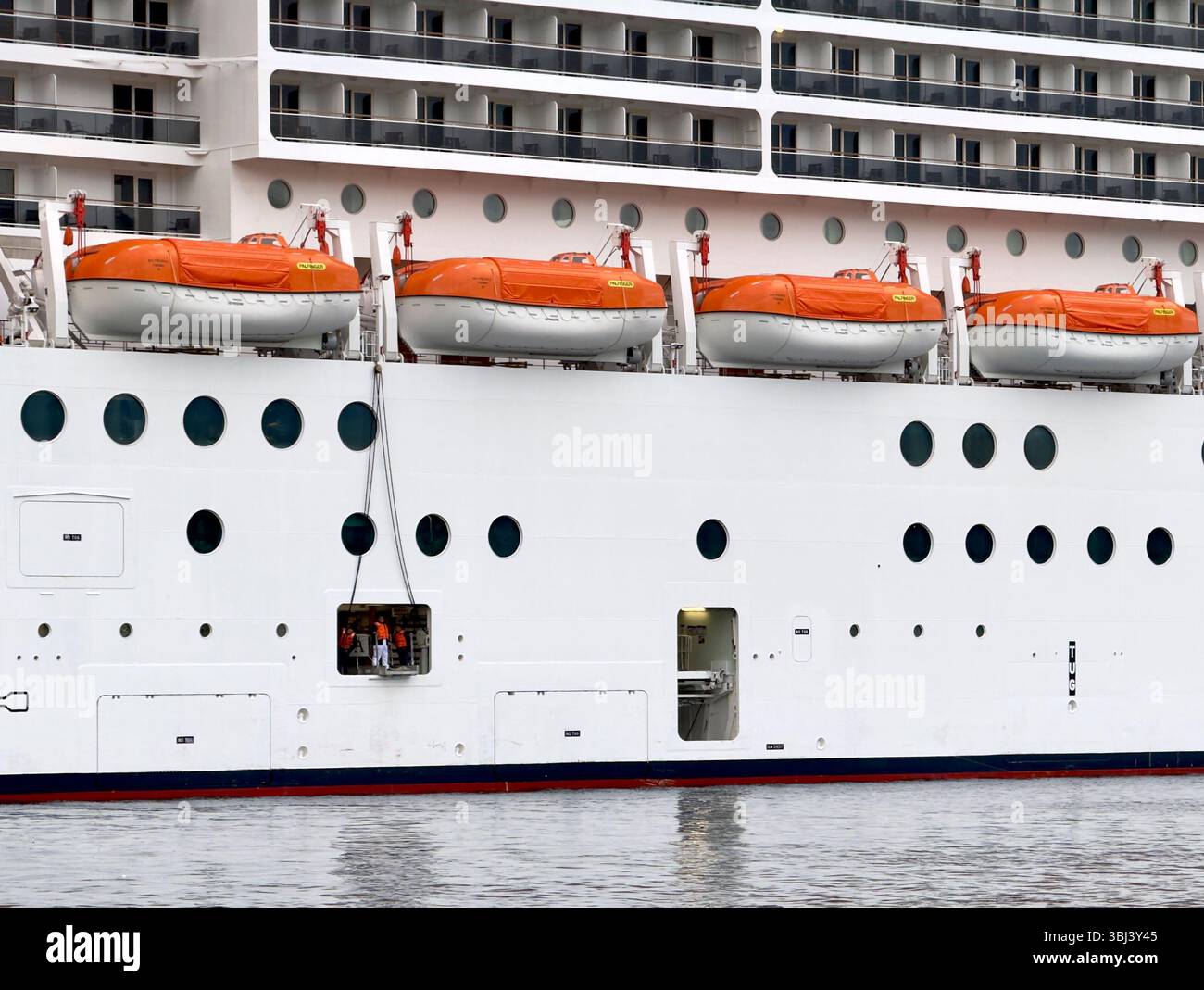 MSC Preziosa arriving at port. Cargo port open. - Smartphone Captured Stock Image