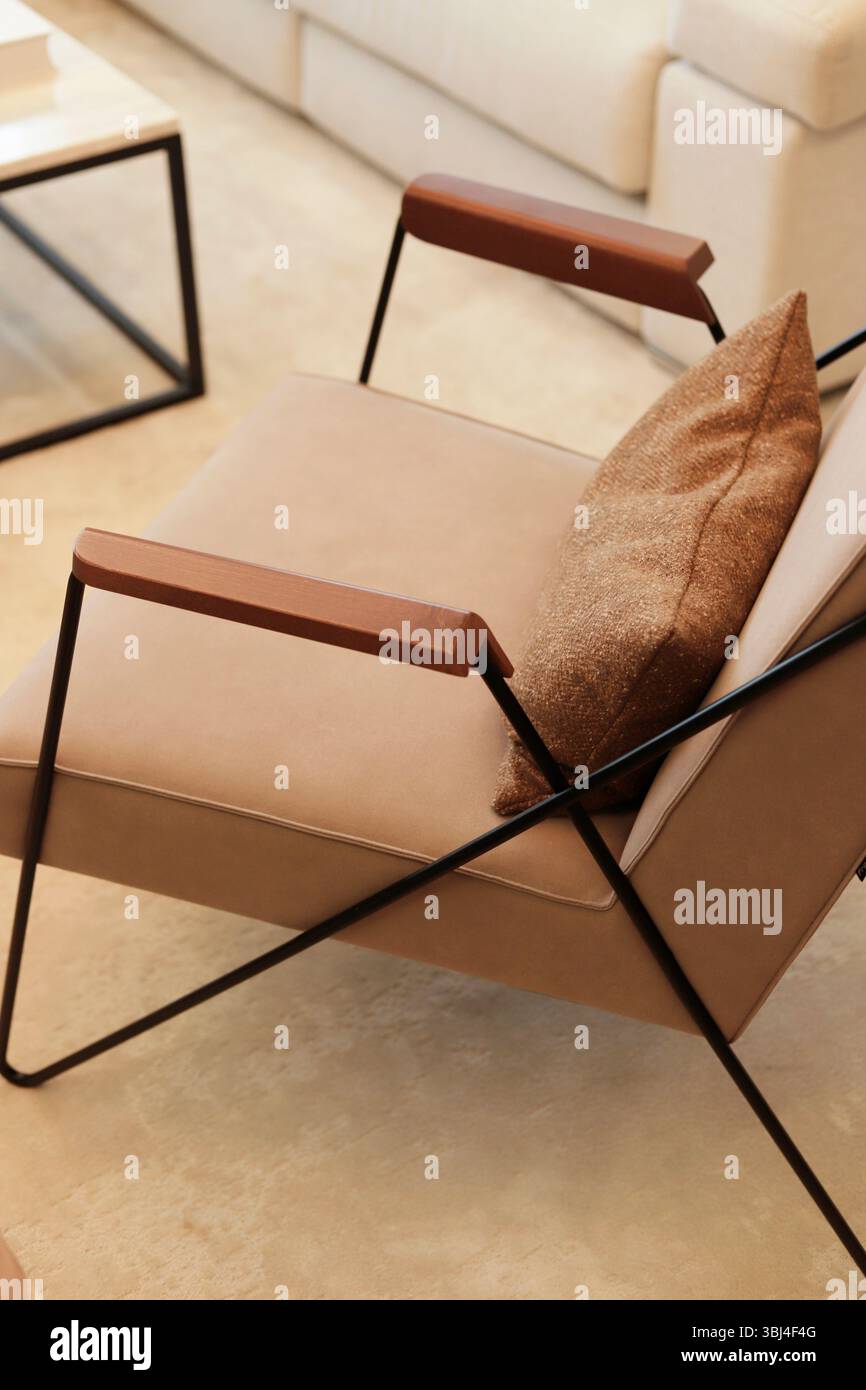 Modern chair on white carpet Stock Photo