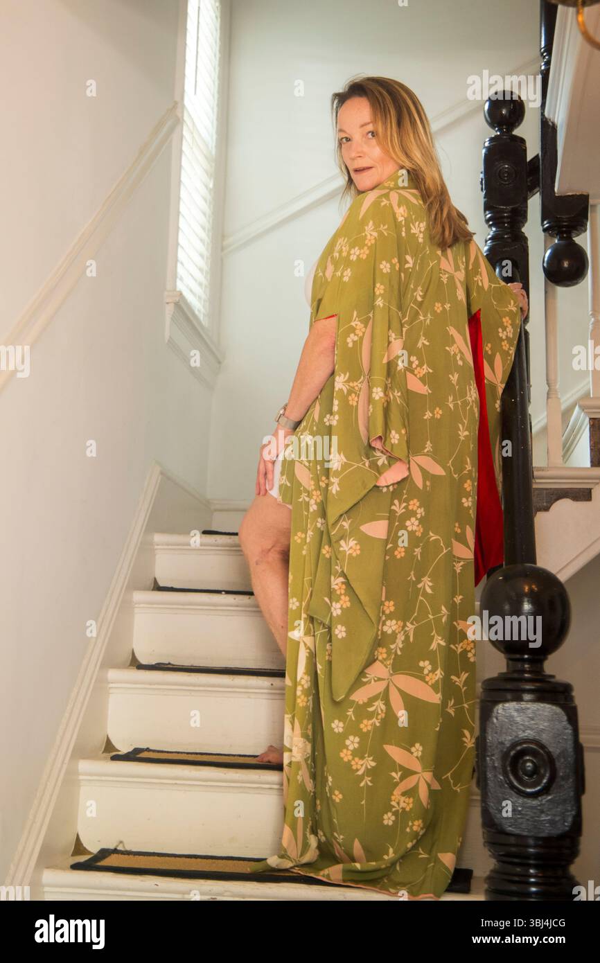 portrait of Mature woman on Steps Stock Photo