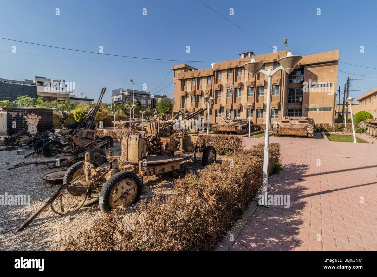 Military equipment at the grounds of Amna Suraka (Red prison) museum of the human rights abuses under Saddam Hussein's rule in Sulaymaniyah (Slemani), Stock Photo