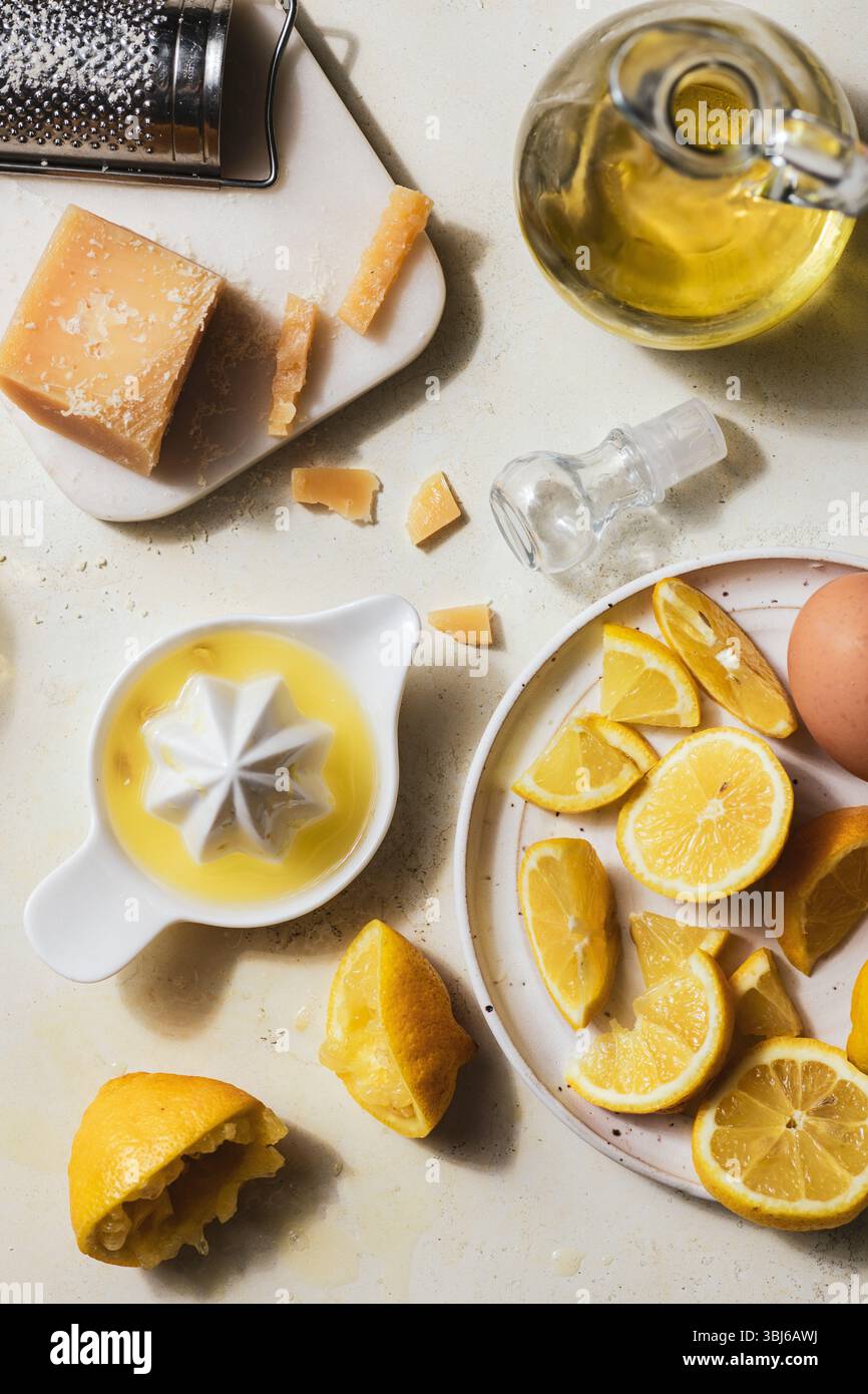 Juiced lemons, cheese, and oil arranged for citrus-based recipe-2.jpg Stock Photo