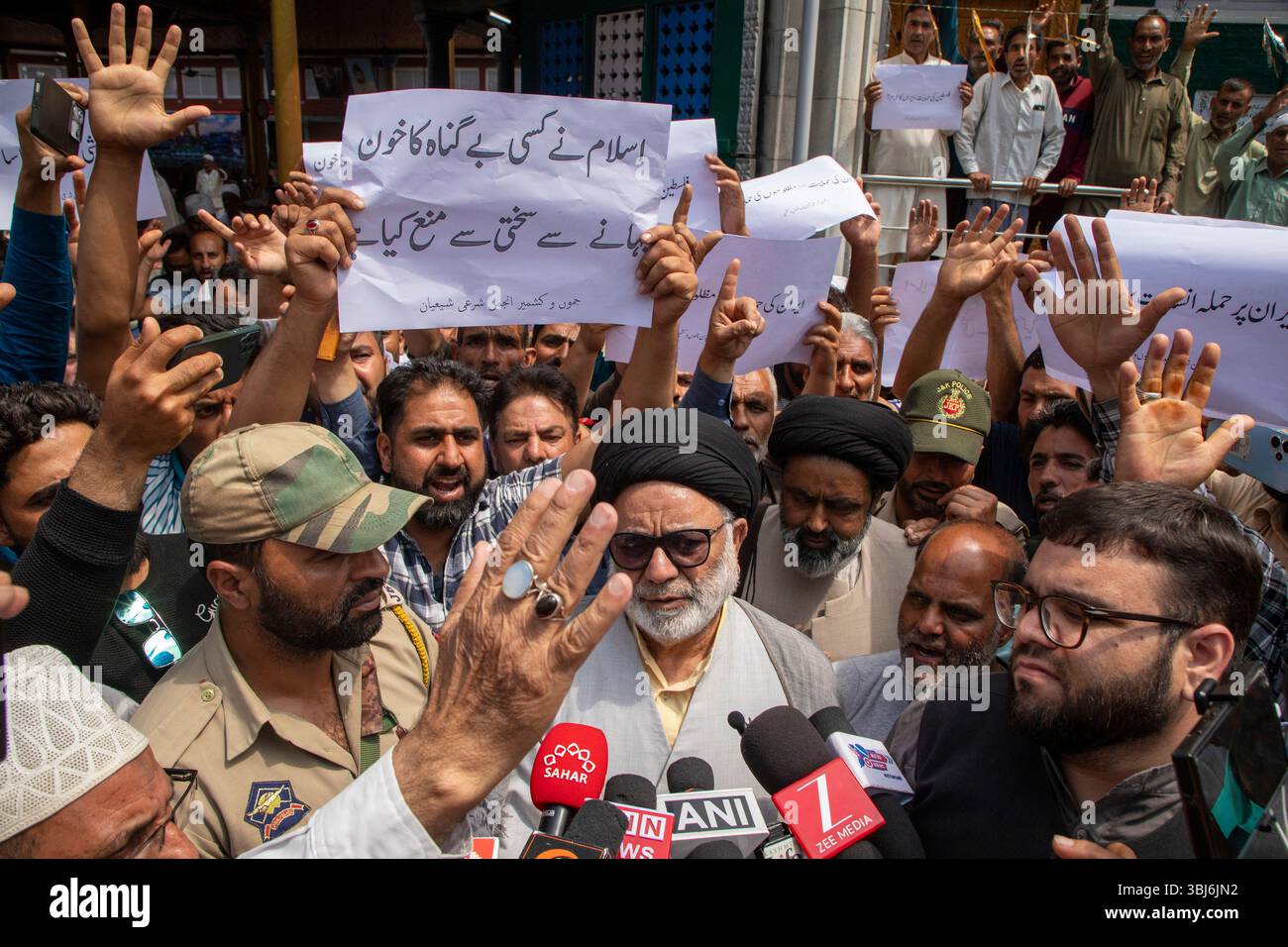 Kashmiri Shiite Muslims hold placards as they chant Pro-Iranian and ...