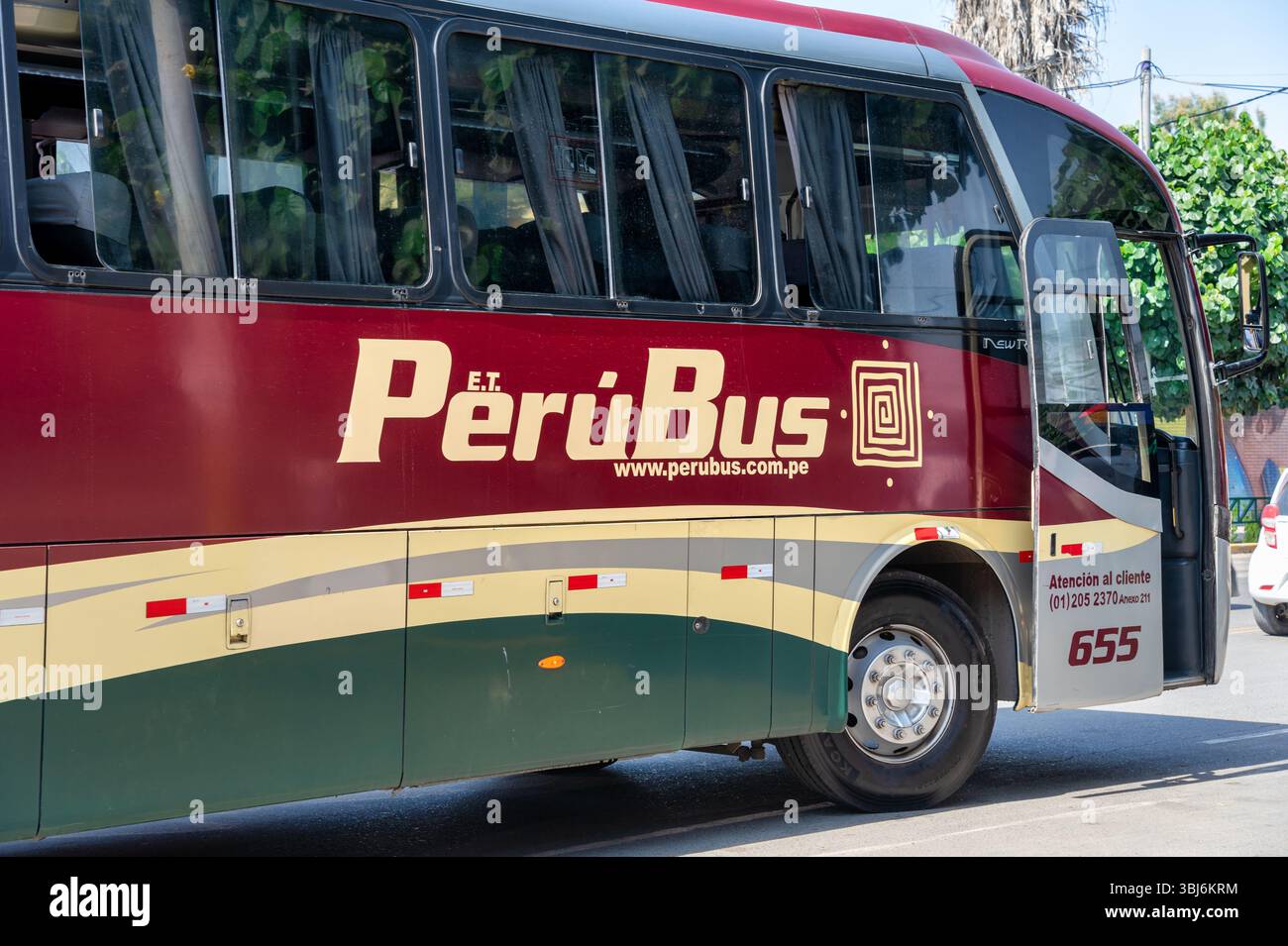 Ica, Peru - March 13, 2025:A coach bus belonging to the Peru Bus company parked at the bus station in the city of Ica Stock Photo