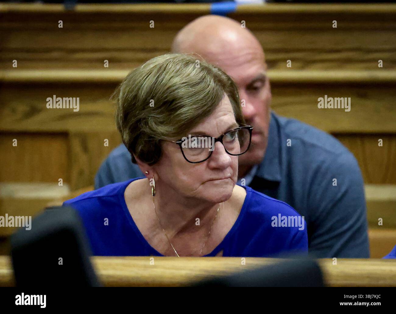 Peggy O'Keefe, mother of murder victim John O'Keefe, listens to