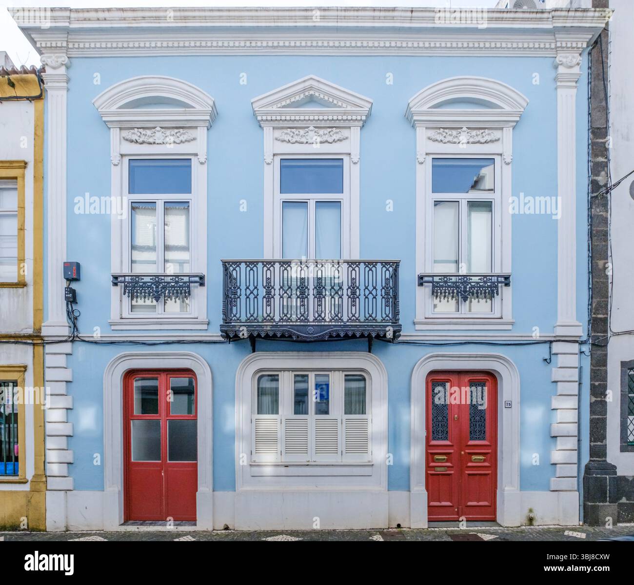 Charming Blue Azorean Townhouse With Red Doors And Ornate Details in ...