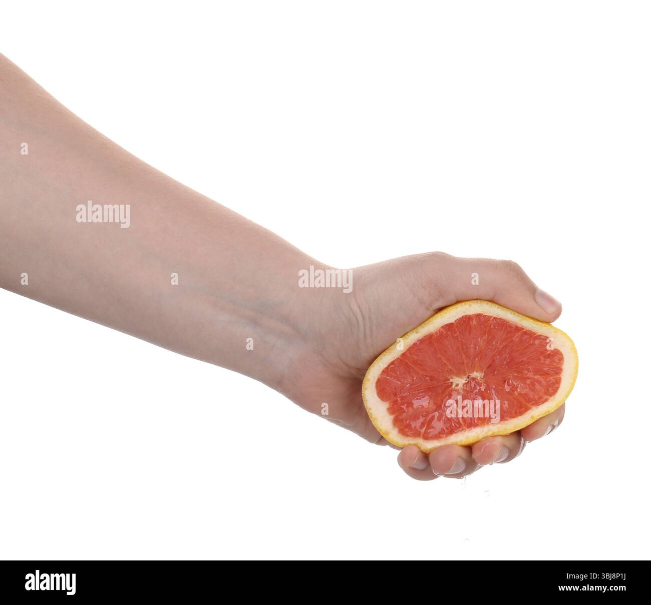 Woman squeezing grapefruit on white background, closeup Stock Photo