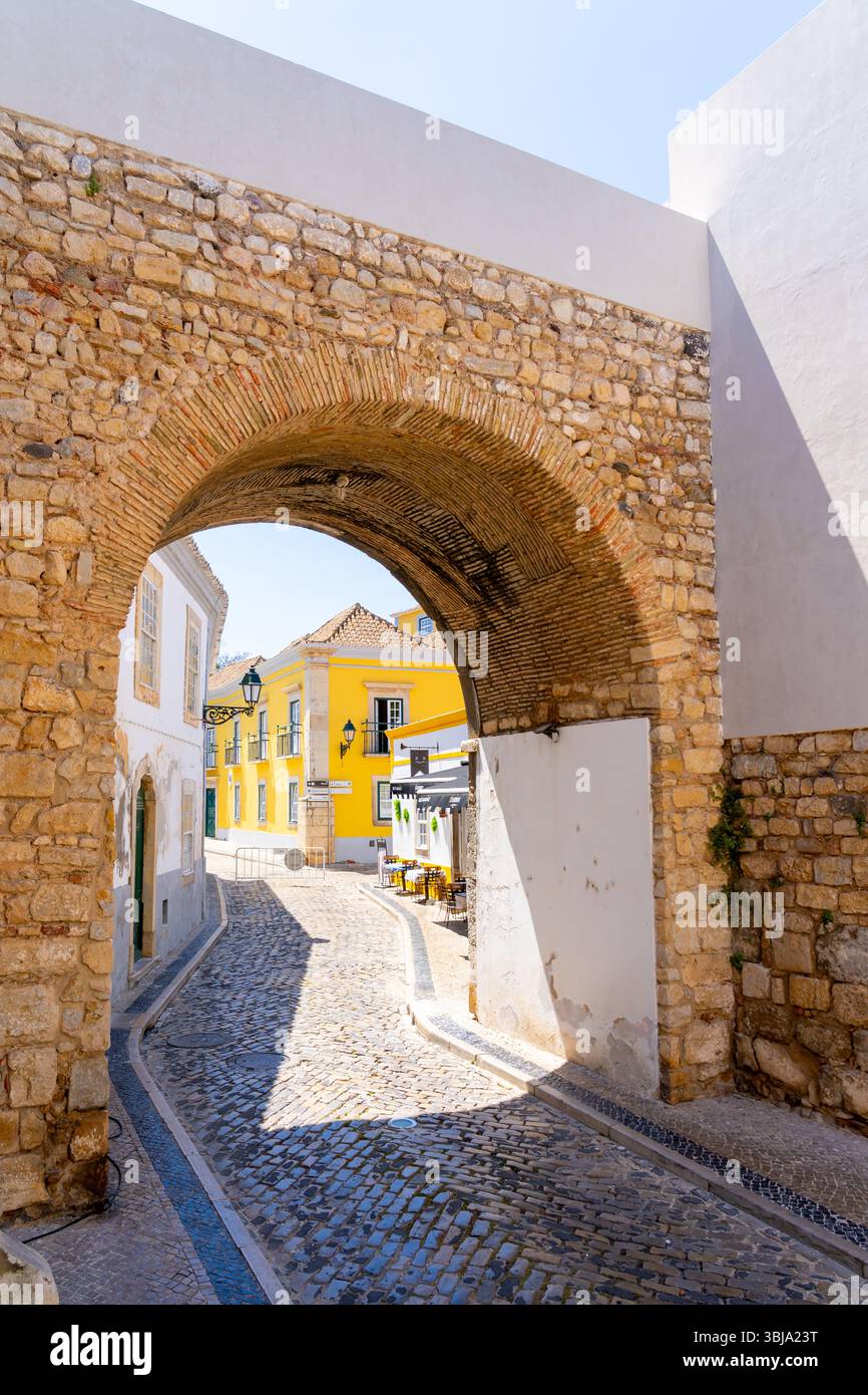 Arco da Vila gateway to the Old Town in Faro, Portugal. Stock Photo