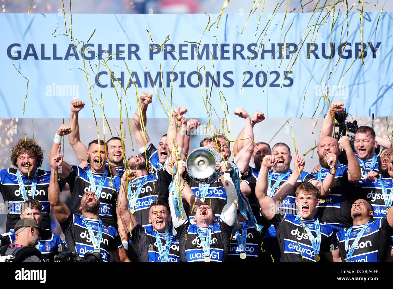Bath Rugby's Ben Spencer (centre) lifts the trophy with team-mates ...