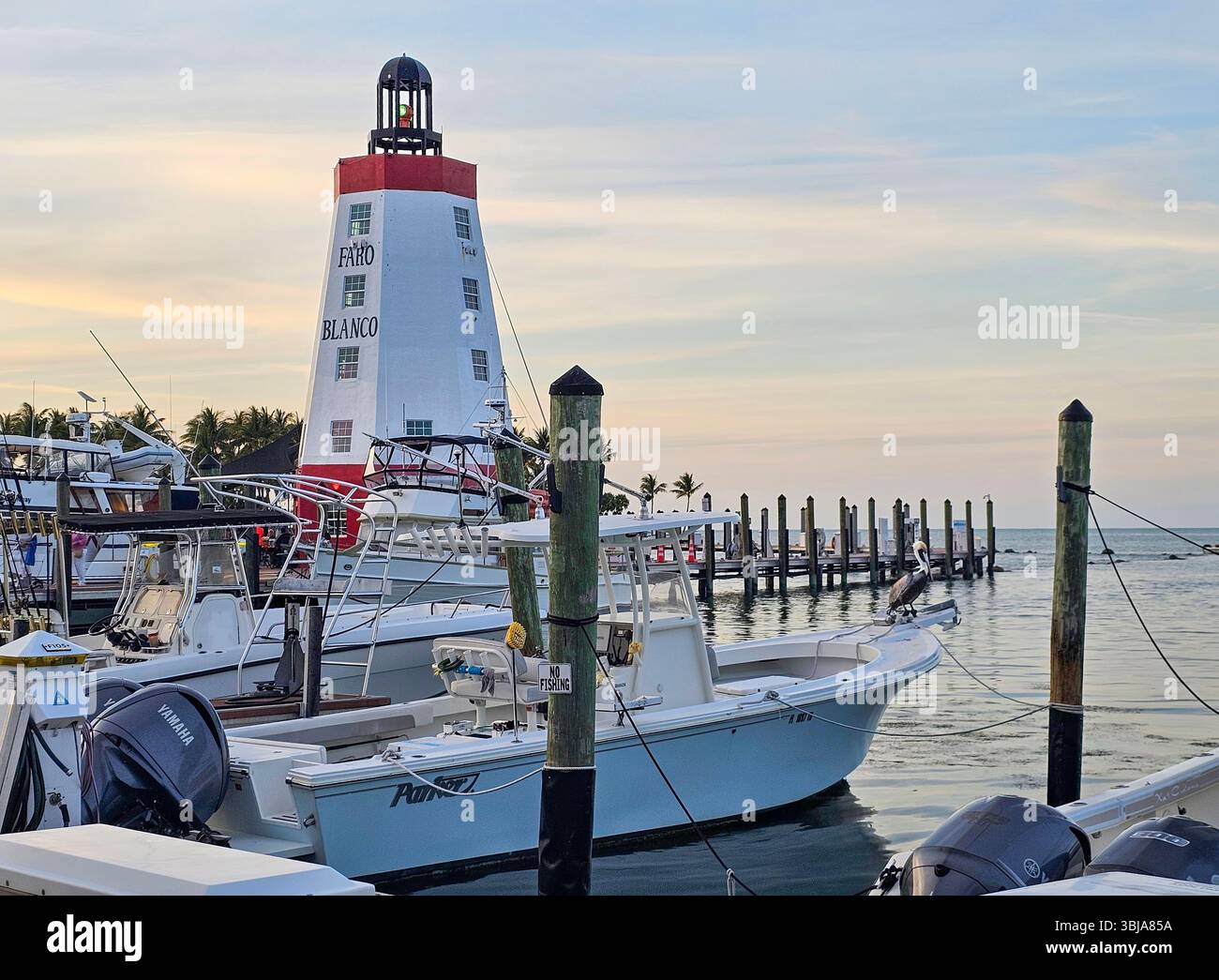 Faro Blanco Marina, Marathon, Florida. A lighthouse is a prominent feature of the marina on the north side of Marathon in the Florida Keys. - Smartphone Captured Stock Image
