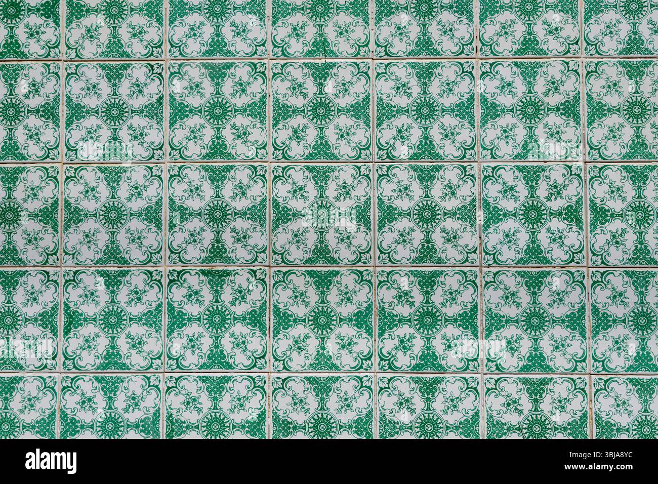 Traditional Decorative Green and White Ceramic Tiles Pattern Stock Photo