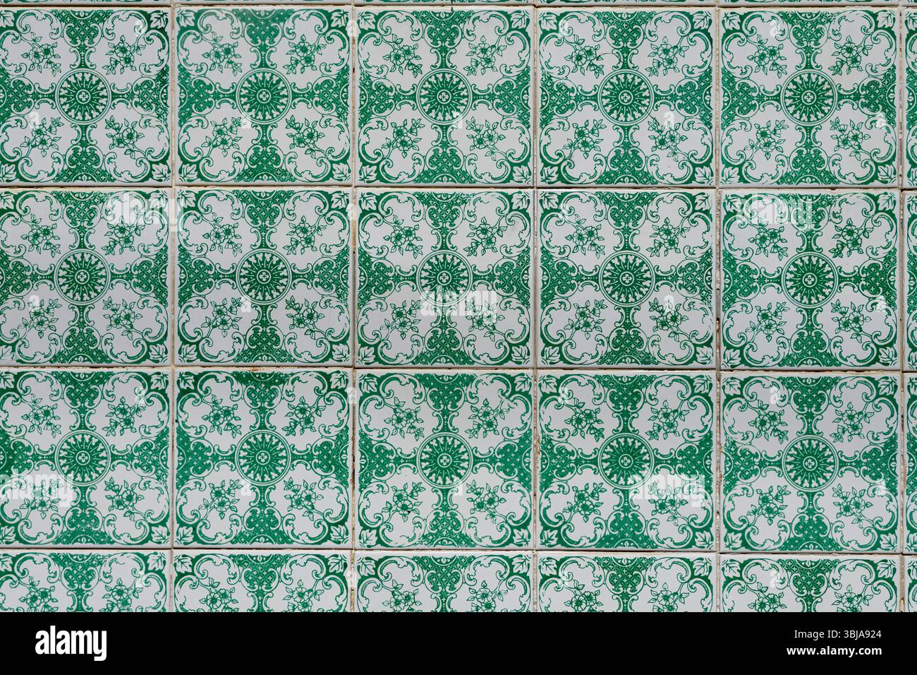 Traditional Decorative Green and White Ceramic Tiles Pattern Stock Photo