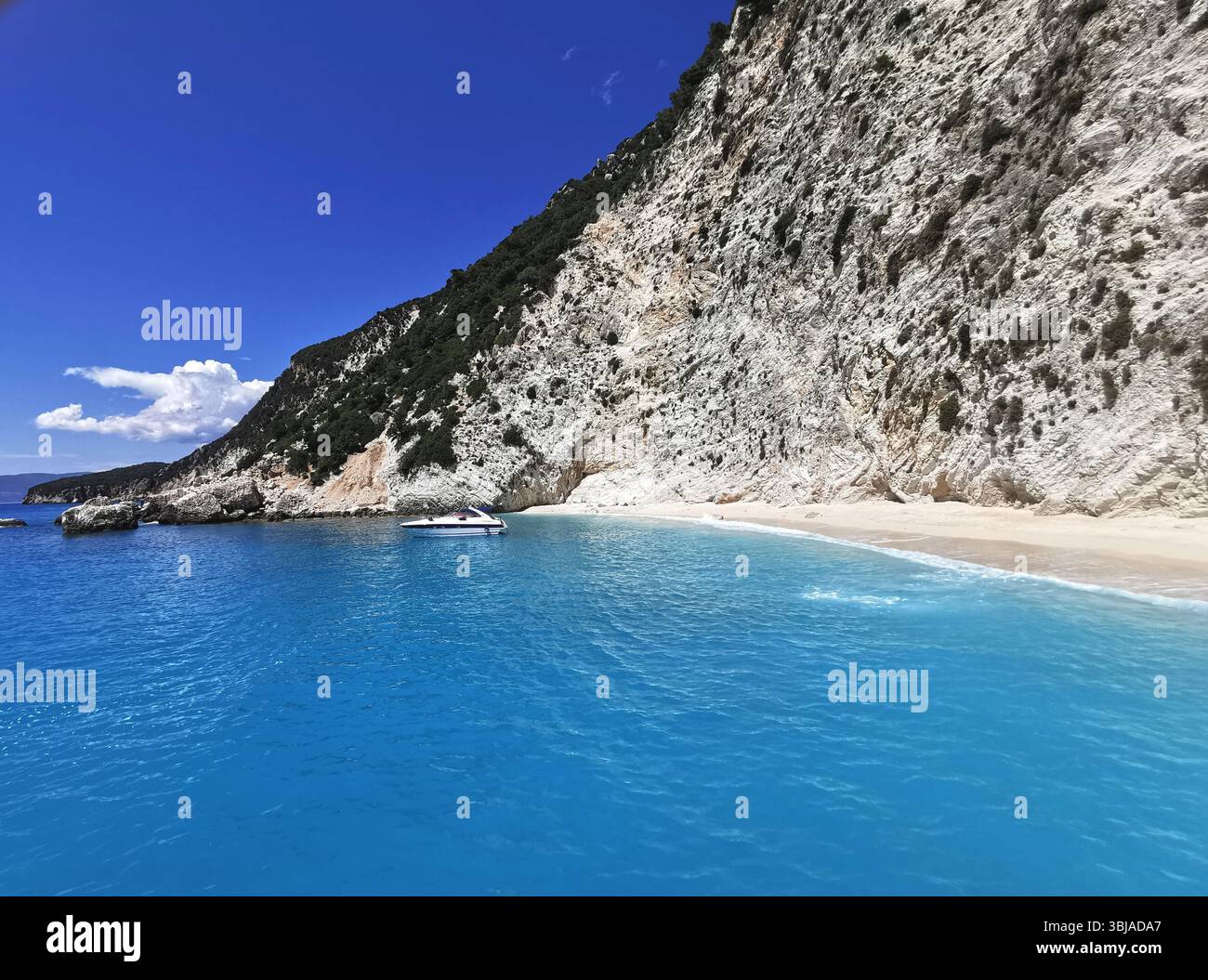 Afales Bay on the north coast of Ithaca Island in the Ionian Sea, Greece. Stunning white beaches backed by dramatic limestone cliffs. - Smartphone Captured Stock Image