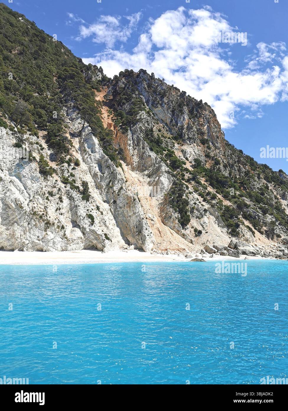 Afales Bay on the north coast of Ithaca Island in the Ionian Sea, Greece. Stunning white beaches backed by dramatic limestone cliffs. - Smartphone Captured Stock Image